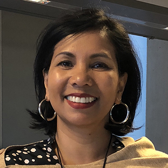 woman with short hair  smiling 