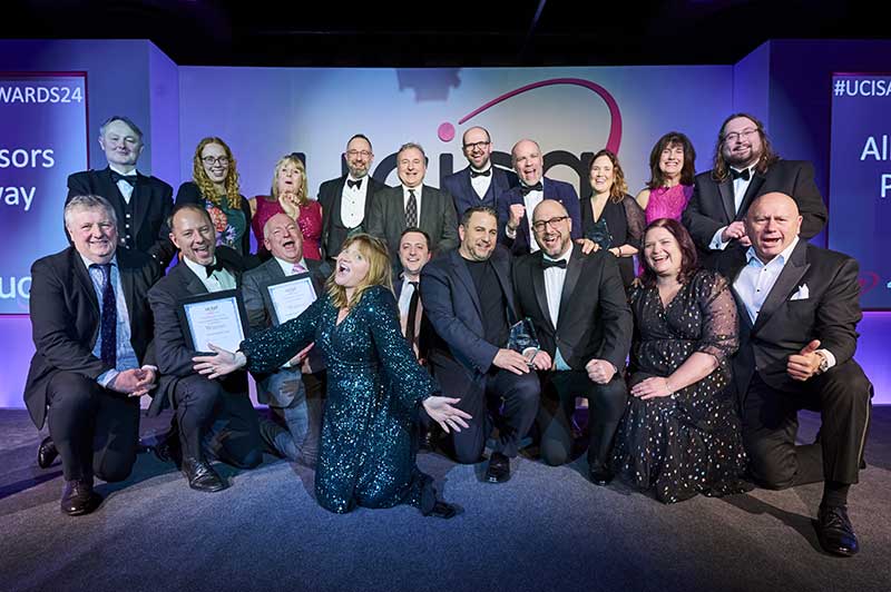 group of people on a stage with Kate Bottley